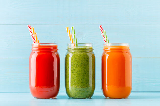 orange green red colored smoothies juice jar 266870 31591
